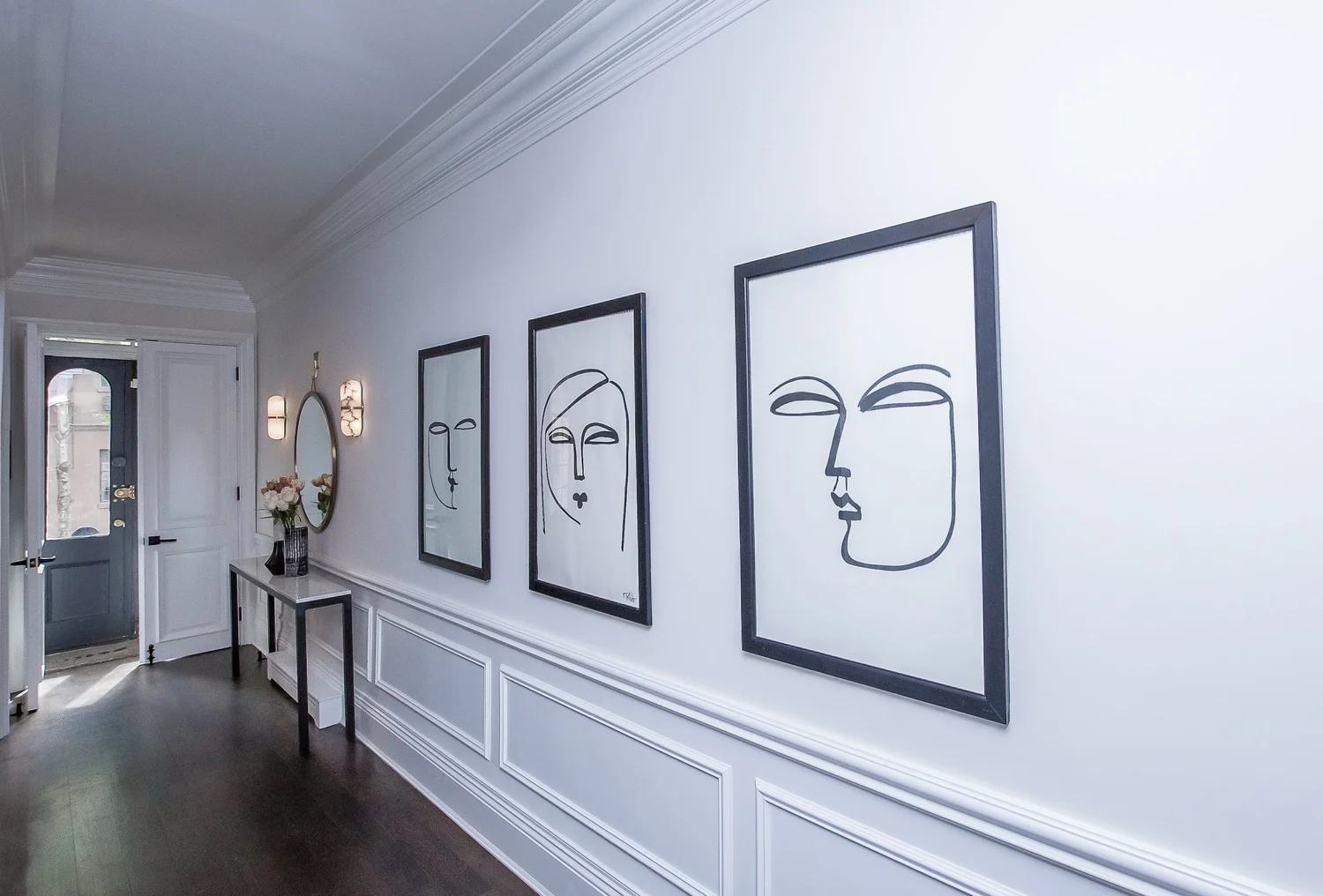 Paneled hallway of a renovated Upper East Side townhouse